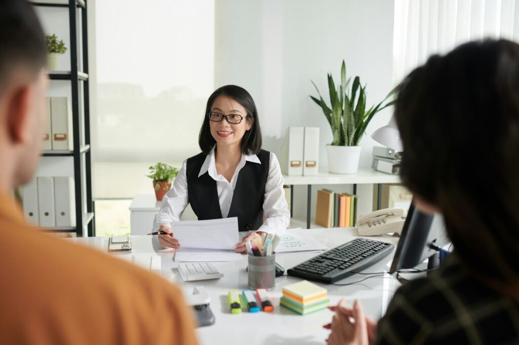 Insurance Agent Talking to Couple